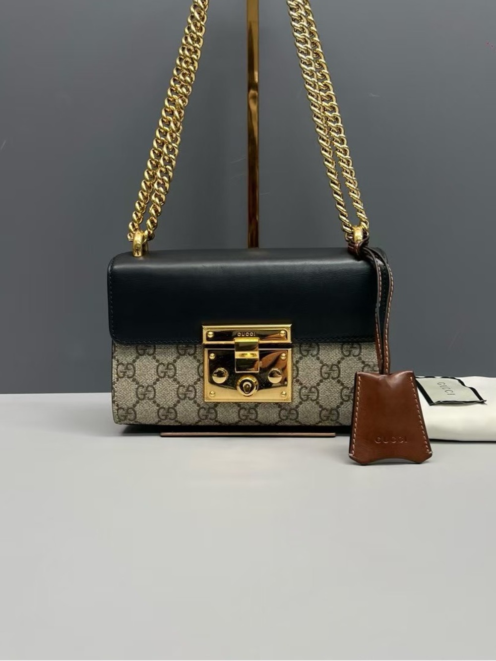Gucci GG Supreme Canvas and Leather Shoulder Bag in Black/Tan